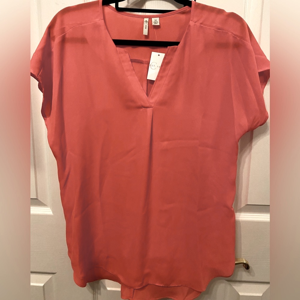 NEW size Medium coral colored short sleeve blouse from Cato